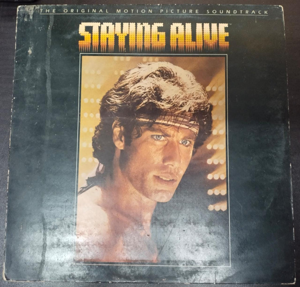 Staying Alive- 1983- English Vinyl Record LP