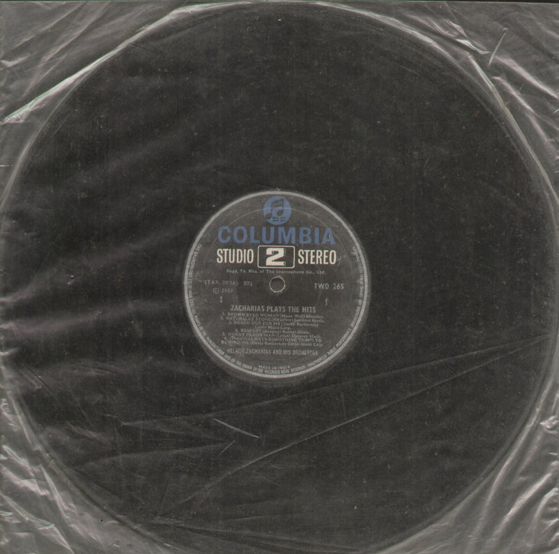 No Sleeve by Zacharias Plays The Hits — LP vinyl record cover