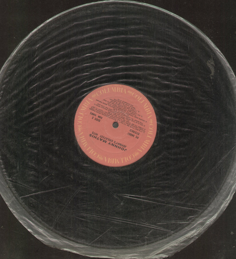 No Sleeve by Johnny Ma This Johnny'syl Greatest Hits — LP vinyl record cover