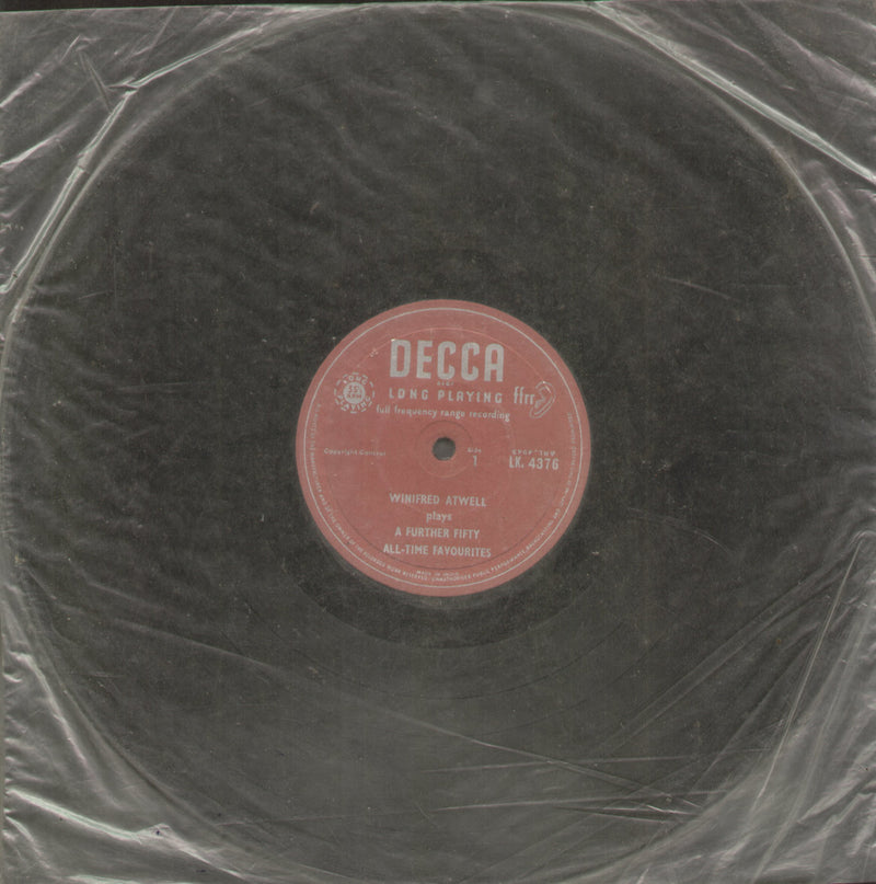 No Sleeve by Winifred Atwell Plays A Further Fifty All Time Favourites — LP vinyl record cover